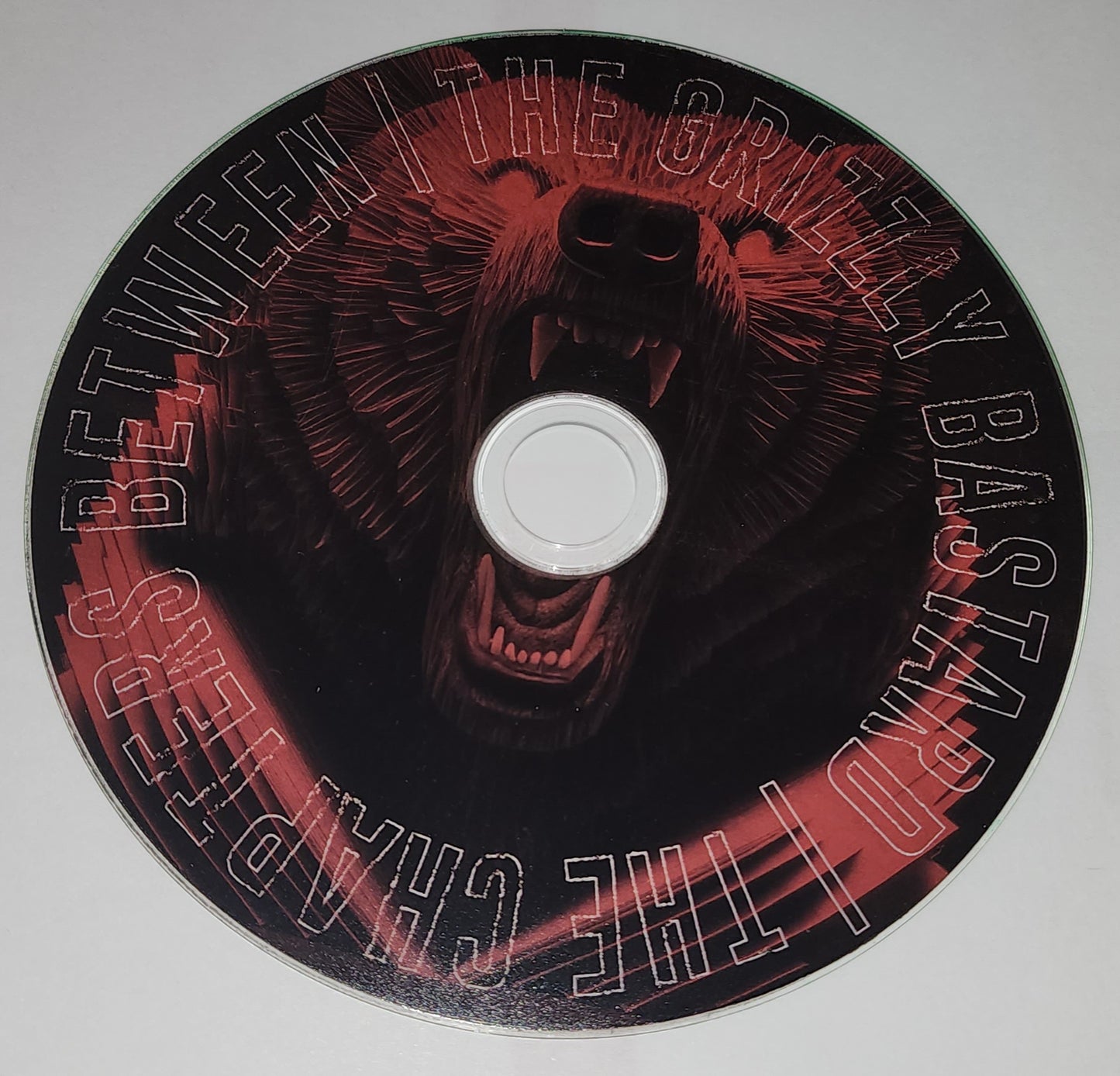 Grizzly Bastard - The Chapters Between (2023) (Autographed CD)